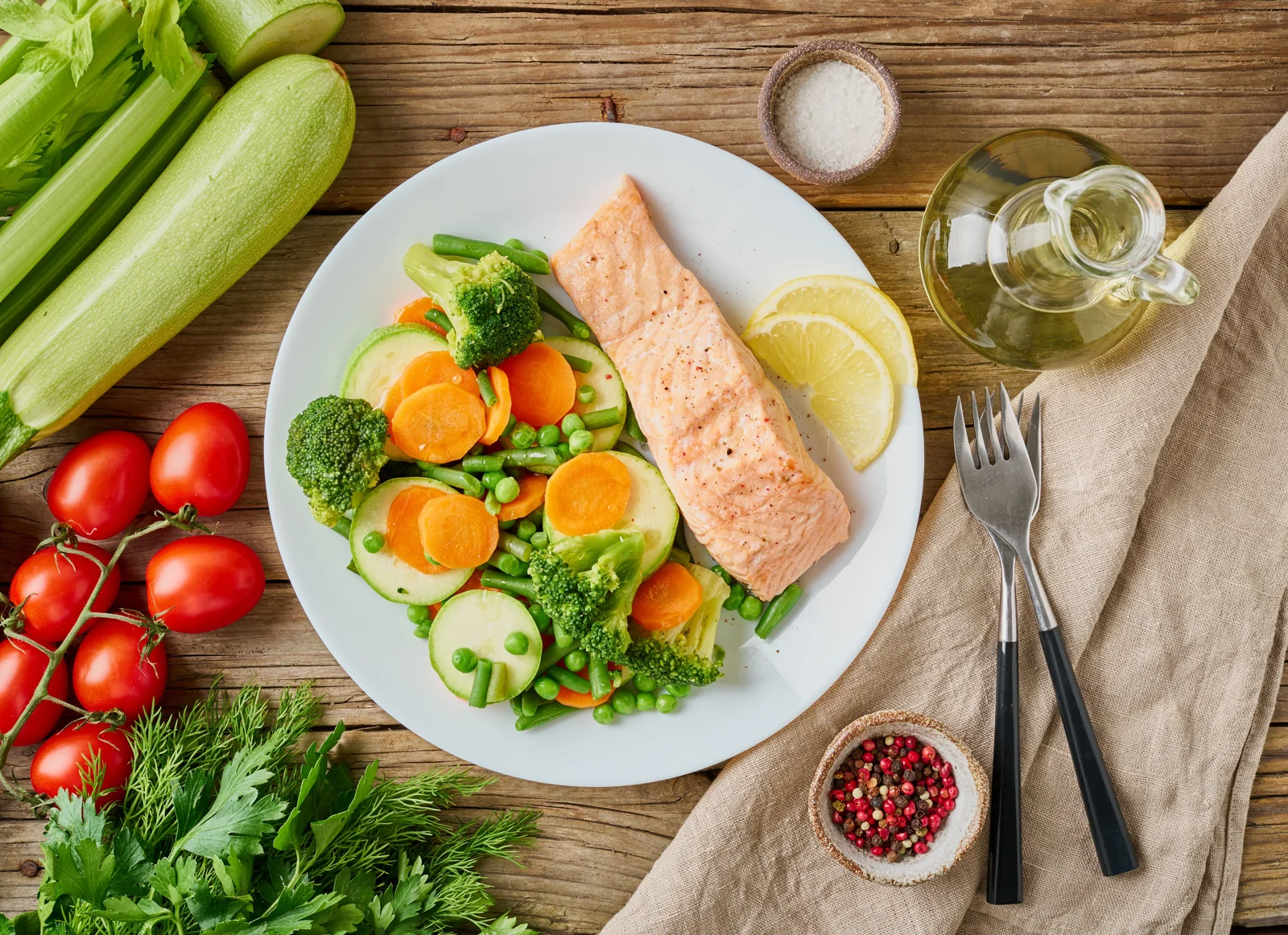 Salmon and Steamed Vegetables Healthy Meal on Table