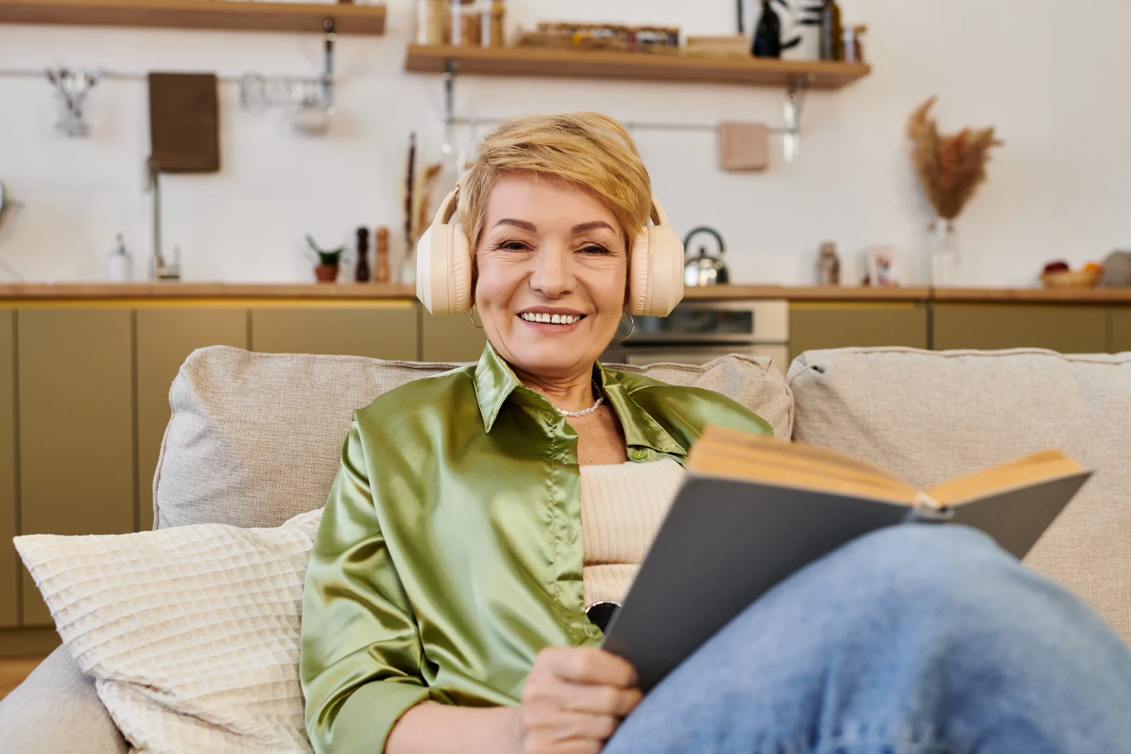 Smiling Woman Relaxing at Home with a Book